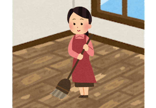 室内を掃除する女性